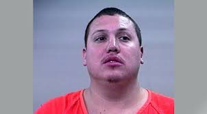 Father arrested in shooting death of driver who killed sons