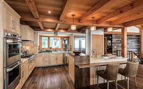Over 300 block house & cottage plans with basement floor and terrace, plus construction cost estimate. A Smart Open Concept Timber Frame Kitchen Layout Features A Balance Between Storage Function And Timber Frame Kitchen Timber Frame Homes Rustic Kitchen Design