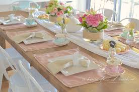Lay down a beautiful tablecloth that matches your theme. How To Decorate A Sweet High Tea Table With Fresh Flowers A House Full Of Sunshine