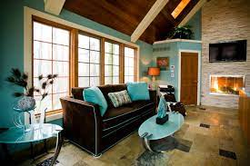 Modern brown and white living room with navy pillows and a carpet. Aqua And Brown Houzz