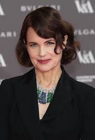 Downton Abbey's Elizabeth McGovern is the epitome of chic in black suit at  V&A exhibition