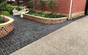 Exposed aggregate driveways are made up of a mixture of cement and other material, usually stones. Exposed Aggregate Driveway Fremantle Hartney Construction Concrete