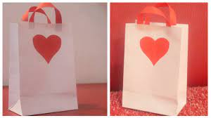 Then, fold the pieces at the bottom of the bag together so the bag is sealed. How To Make A Paper Bag For Gift Diy Paper Bag For Gift Youtube