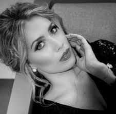 OUT OF THE BASEMENT AND INTO THE LIGHT, CAROLINE SALLEE'S HUSHED  SONGWRITING BENDS EARS TO WHAT