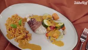 Tomatenreis Mit Hahnchen Im Parmamantel Rezept Essen Trinken Tomaten Reis Tomatenreis Und Zaubertopf