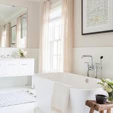 Some of the bathroom's aspects that were popular during the era were clawfoot tubs and plumbing. White And Pink Romantic Bathroom Design Ideas