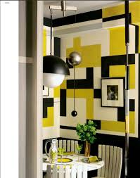 These main areas loft over a basement level featuring 4 bedrooms, a guest room, and a kids' den. This Eclectic Style Paris Residence Is Decorated In A Dramatic Black White And Yellow Dining Room Paint Colors Interior Eclectic Interior