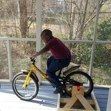 It can be used for intense training sessions by professional cyclists too. Stationary Bike Stand For Kids 6 Steps Instructables