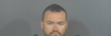 Osceola man faces charges for stabbing man, dog