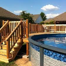 16 Stylish Outdoor Above The Ground Swimming Pools In Ground Pools Above Ground Pool Landscaping Backyard Pool Landscaping