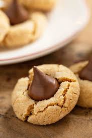 Peanut butter cookies with a chocolate kiss preheat. Peanut Butter Blossoms Classic Christmas Cookie Recipe
