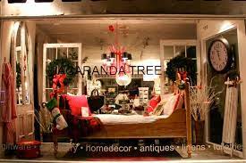 Window At Jacaranda Tree In Toronto Country Store Display Furniture Store Display Diy Store