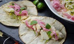 Perfectly seasoned fish bakes in minutes in either a toaster oven or a conventional oven and topped with a dressing ingredients: Pescado Con Vino Fish With White Wine