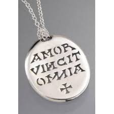 The Prioress Wore A Piece Of Jewelry With The Phrase Amor Vincit Omnia Meaning Love Conquers All Jewelry Jewelry Inspiration Necklace