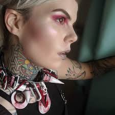 regretting colored neck tattoo