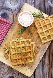 Potato pancakes are delicious, but you can make potato waffle sandwiches, put fried eggs and all manner of sauces on top of the potato waffle, make fried chicken and potato waffles, potato waffle burgers. The Iron You Flourless Herbed Potato Waffles