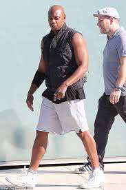 No matter how old you are, if a little kid hands you a toy phone.answer it. Dave Chappelle Shows Off His Bulging Biceps In A Tank Top Daily Mail Online