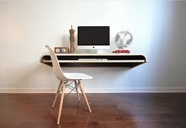 This office desk has a working panel that can be closed when not in use, meaning not only do you save space but create a convenient storage area. 13 Floating Desks For Your Small Workspace Wall Mounted Desks