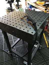 My Welding Table Finished Look Carefully And You Ll See The Company That Plasma Out The Holes In The Top Missed One Welding Table Table Plans Welding Tables