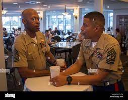 Master Gunnery Sergeant Jorge A. Baca, the Recruiter Instructor for 6th  Marine Corps District (MCD), speaks to MGySgt. Ramone P. Gallimore, the  Recruiter Instructor for Recruiting Station Tampa, during the 6th MCD