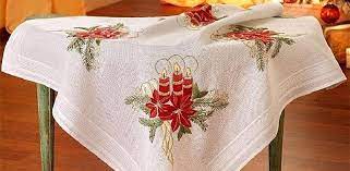 A solid red christmas cloth with no cutwork or embroidery on the center portion of the cloth. Deco Line Freestyle Embroidery Tablecloth Kit Christmas Pointsettia 643989694114 Ebay