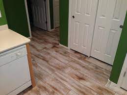 Wood look tile #ceramicflooringideas #flooringideas herringbone pattern using my mohawk treyburne antique chateau 6x24 tile. Mohawk Flooring Treyburne Antique Chateau Rustic Kitchen San Francisco By Qualityflooring4less Com Houzz