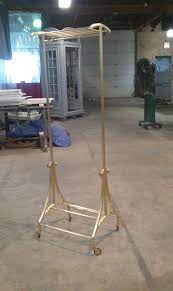 Visit our shops & view our full range. Handmade Custom Brass And Bronze Rolling Clothing Rack By Hulse Design Build Llc Custommade Com