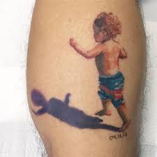 There's something special about the way a mother holds her child, especially in the first few months after birth. Watercolor Style Child Tattoo On The Calf