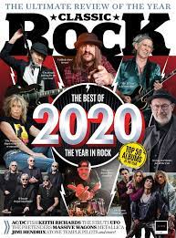 Black and white illustration of head of bandit, outlaw or highwayman wearing cowboy hat and face mask, bandana, kerchief or bandanna front view on isolated background in retro style. Classic Rock Issue 01 2021