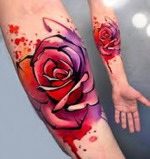 With an expert tattoo stylist, you can blend the design with a mixture of bold colors and elements. 60 Creative Watercolor Rose Tattoo Designs