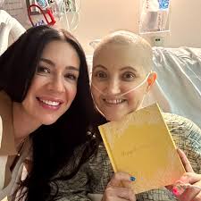 Kjirsten has been Abby's friend for 35 years. She brought her a book of  quotes with pictures of her and her girlfriends and a giant swing. She  wrote the most beautiful note