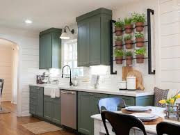 Cody And Katie Messerall S Kitchen From Fixer Upper Season 3 Episode 16 Herb Garden Rack Fixer Upper Kitchen Upper Kitchen Cabinets White Shiplap Wall