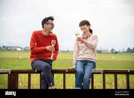 Asian couple 40s hi-res stock photography and images - Alamy