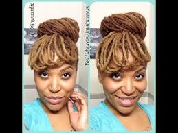 Dreadlock bun with straight bangs the straight bangs with the dreadlock bun give a charming look to women. Faux Bangs And Bun Faux Bangs How To Style Bangs Beautiful Black Hair