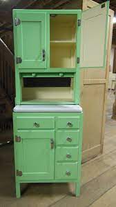 A hoosier cabinet is a cabinet with lower storage, upper storage, and a countertop. Miniature Hoosier Cabinet Replica Made By Our Coppes Commons Historian Vintage Kitchen Cabinets Hoosier Cabinet Cottage Kitchen Inspiration
