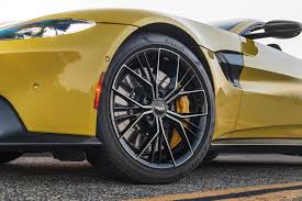 Image result for New Yellow 2020 Aston Martin