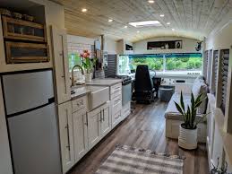Converted School Bus Is A Cozy Tiny Home On Wheels Old School Bus School Bus House School Bus Tiny House