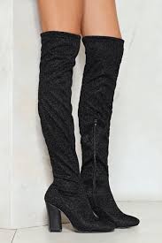 The knife boots feature a pointed toe and a stiletto heel, are constructed from sequined stretch fabric, and retail for $3,900. Over The Knee Sparkle Boots Online