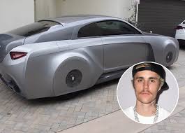 Justin bieber's white ferrari was parked after a traffic stop and the photographer was hit as he walked across the boulevard after taking pictures. See Justin Bieber S Custom Rolls Royce