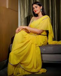 Lawrence is left with only half. Surbhi Puranik Shines Bright In A Yellow Ruffle Saree For An Inaugrational Event