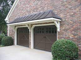 Pin By Amanda Cylkowski Loiselle On Remodel In 2021 Metal Garage Doors Garage Door Makeover Garage Doors