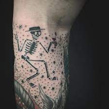 Little Cute Skeleton As A Filler For Traditional Sleeve For My Friend Socialdistortion Skeleton Tattoo Sleeve Filler Best Sleeve Tattoos Traditional Tattoo