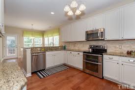 We originated in california and relocated to at awa kitchen cabinets, we're proud to not only provide clients with a wide range of beautiful. Kitchen Cabinets Painted Baby Fawn White In The Long Lake Neighborhood In Raleigh Nc
