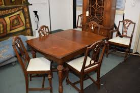 American antique mahagony drop leaf table with leaf circa 1930. Antique Dining Room Suite With Dining Table With Jackknife Leaf Six Chairs Including One Carver And