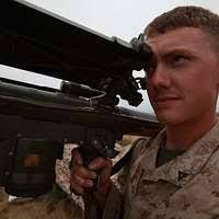 US Marine Corps (USMC) Sergeant (SGT) Chris Bautista, Motor Transportation  Operator, 4th Low Altitude Air Defense (LAAD) Battalion (BN), Marine Corps  Base (MCB) Camp Pendleton, California (CA), performs a weapon's check of