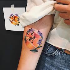This tattoo, rendered in black ink, shows a cluster of roses depicted inside of a triangular vignette on the inside of the wearer's right arm. Sasha Unisex At Roma Tattoo Museum Roma Tattoo Museum Facebook