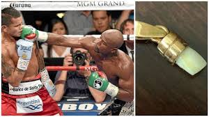 Manny pacquiao on floyd mayweather vs manny pacquaio i have been training 5 years for this fight! Boxeo Chino Maidana Provoca A Mayweather Haciendose Un Colgante Con Su Diente Marca Com