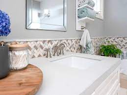 Using a level, draw a line at uniform height across the wall. How To Install A Tile Border In A Bathroom Diy