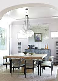 A Spanish Style 1920s Bungalow Gets A Modern Makeover Dining Room Interiors Dining Room Nook Bright Dining Rooms