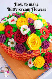 To make the base of the rose, hold the bag straight up with tip 12 slightly above center of flower nail. How To Make Buttercream Flowers Veena Azmanov